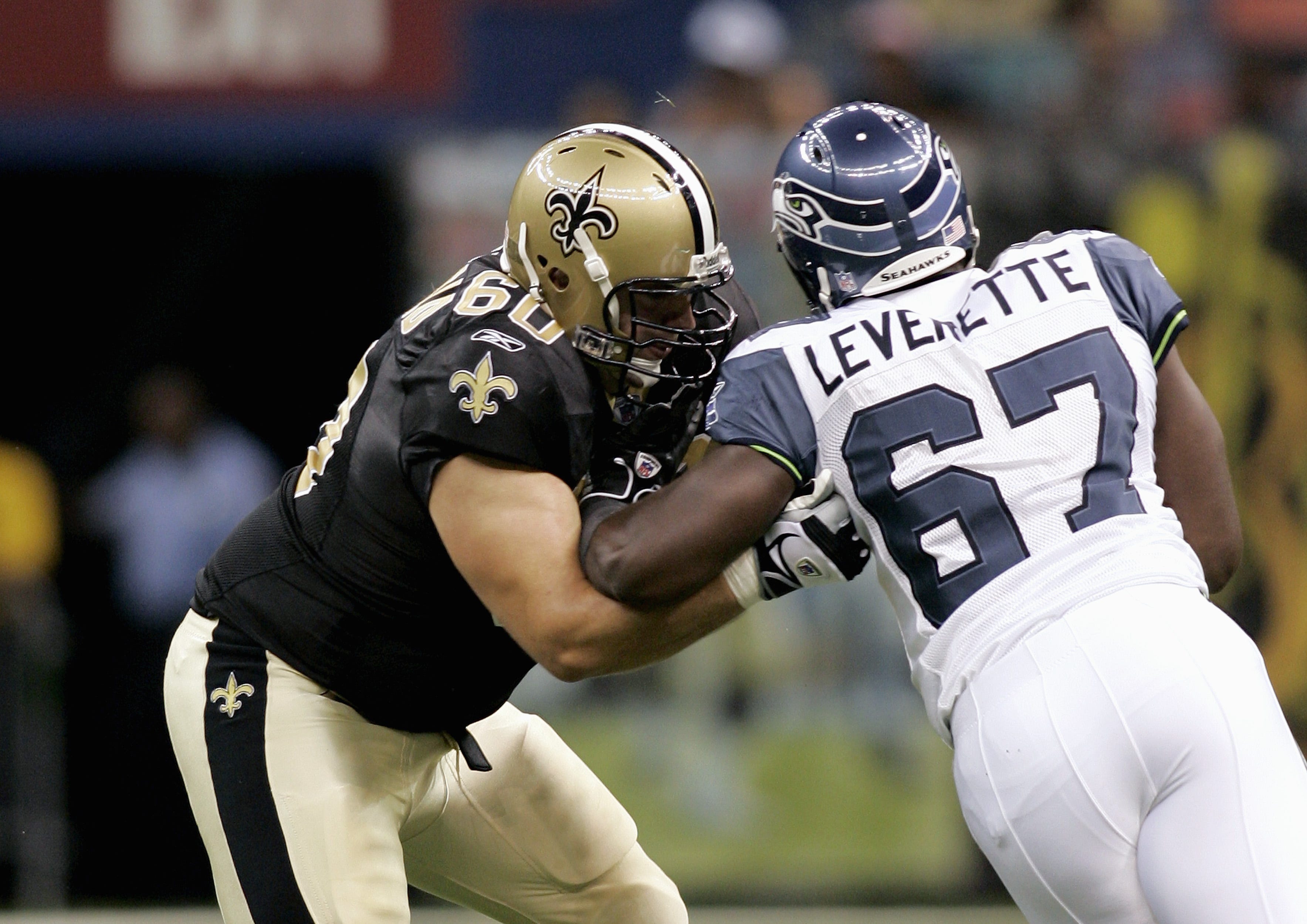 NEW ORLEANS - AUGUST 12: Tackle Ben Archibald #60 of the New Orleans Saints blocks defensive end Otis Leverette #67 of the Seattle Seahawks during the preseason game on August 12, 2005 at the Superdome in New Orleans, Louisiana. The Seahawks won 34-15. (Photo by Chris Graythen/Getty Images)