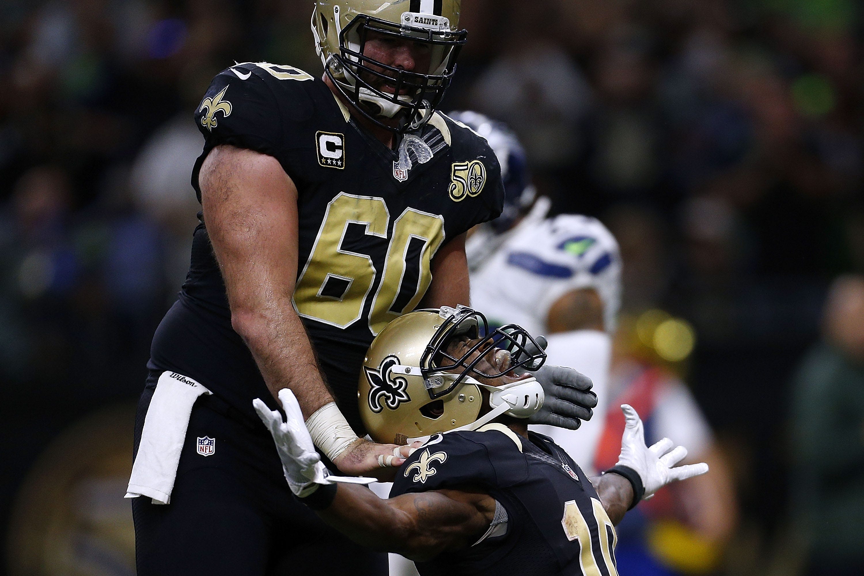 NEW ORLEANS, LA - OCTOBER 30: Brandin Cooks #10 of the New Orleans Saints celebrates his touchdown with Max Unger #60 during the second half of a game against the Seattle Seahawks at the Mercedes-Benz Superdome on October 30, 2016 in New Orleans, Louisiana. (Photo by Jonathan Bachman/Getty Images)