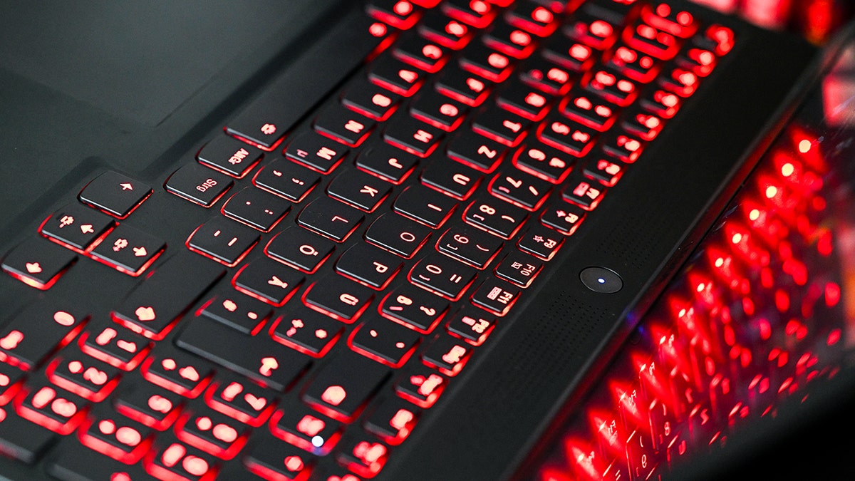 Black keyboard with red lights.